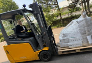 Dana with Forklift after Certification
